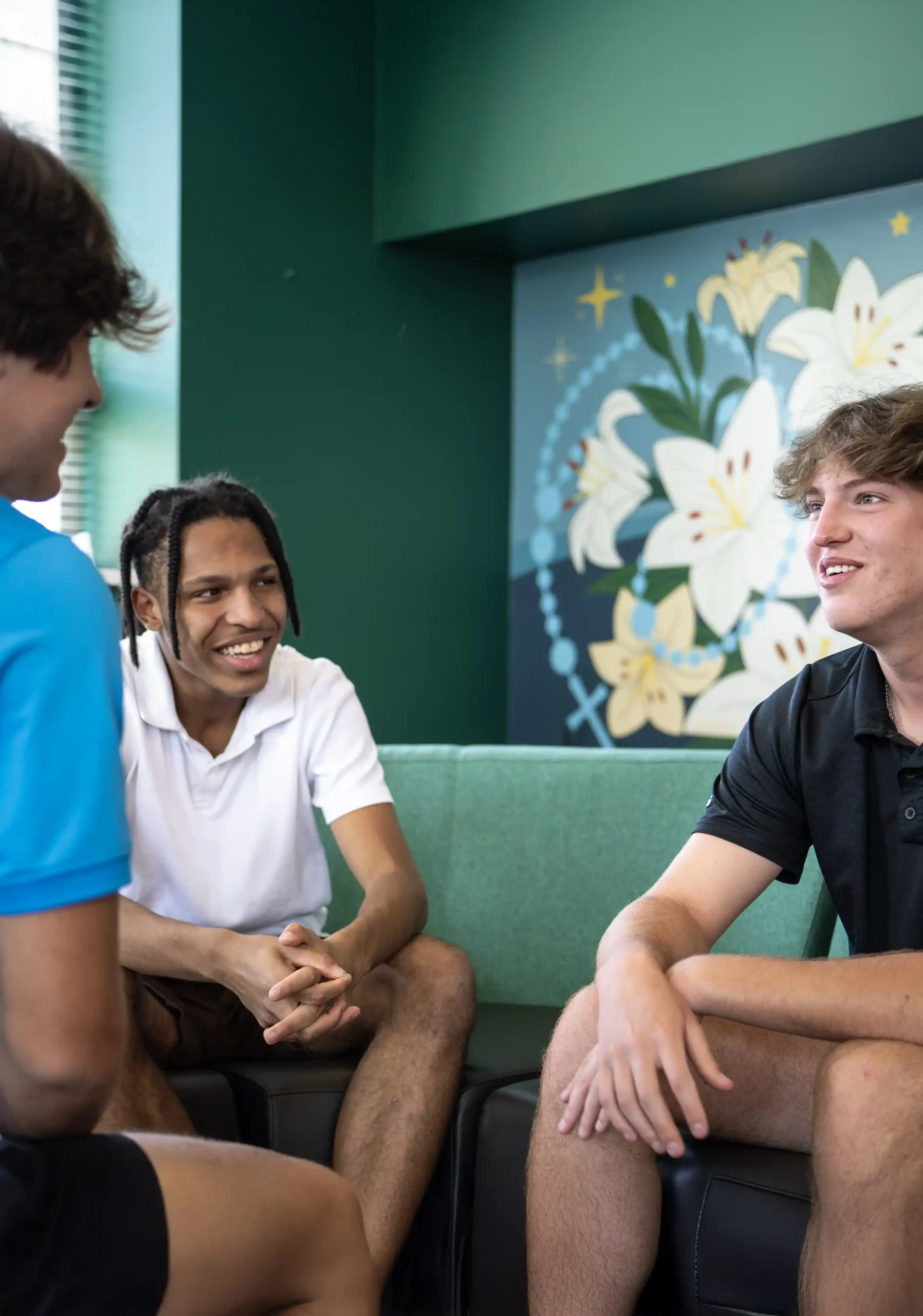 3 students sitting in a group